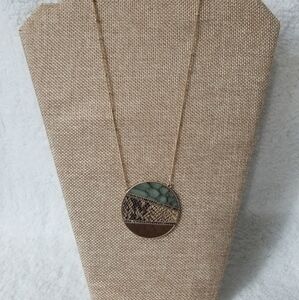 Leather look medallion snake skin  necklace